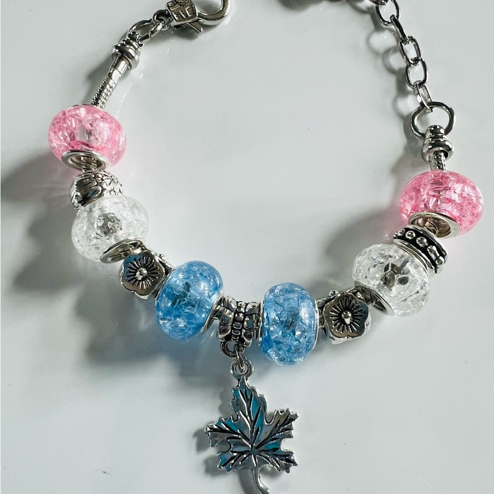 Elegant Silver Charm Bracelet with Pink and Blue Beads